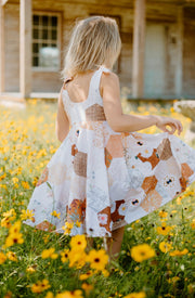 Girls organic cotton patchwork twirl dress with tie top