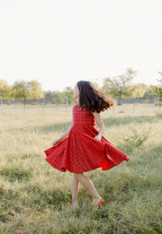 Bright red and metallic gold plaid Christmas twirl dress for girls