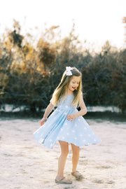 Little girls twirl dress in light blue