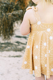 Modern toddler twirl dress in mustard
