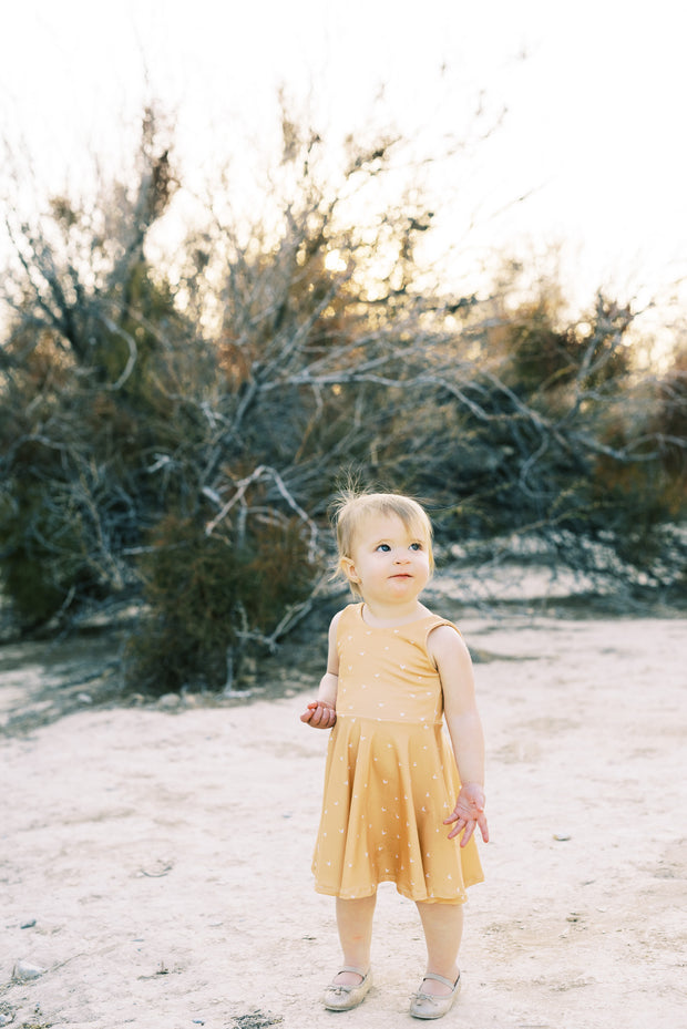 Modern twirl dress in mustard for little girls