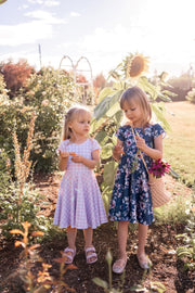 Sunflower and gingham coordinating twirl dresses